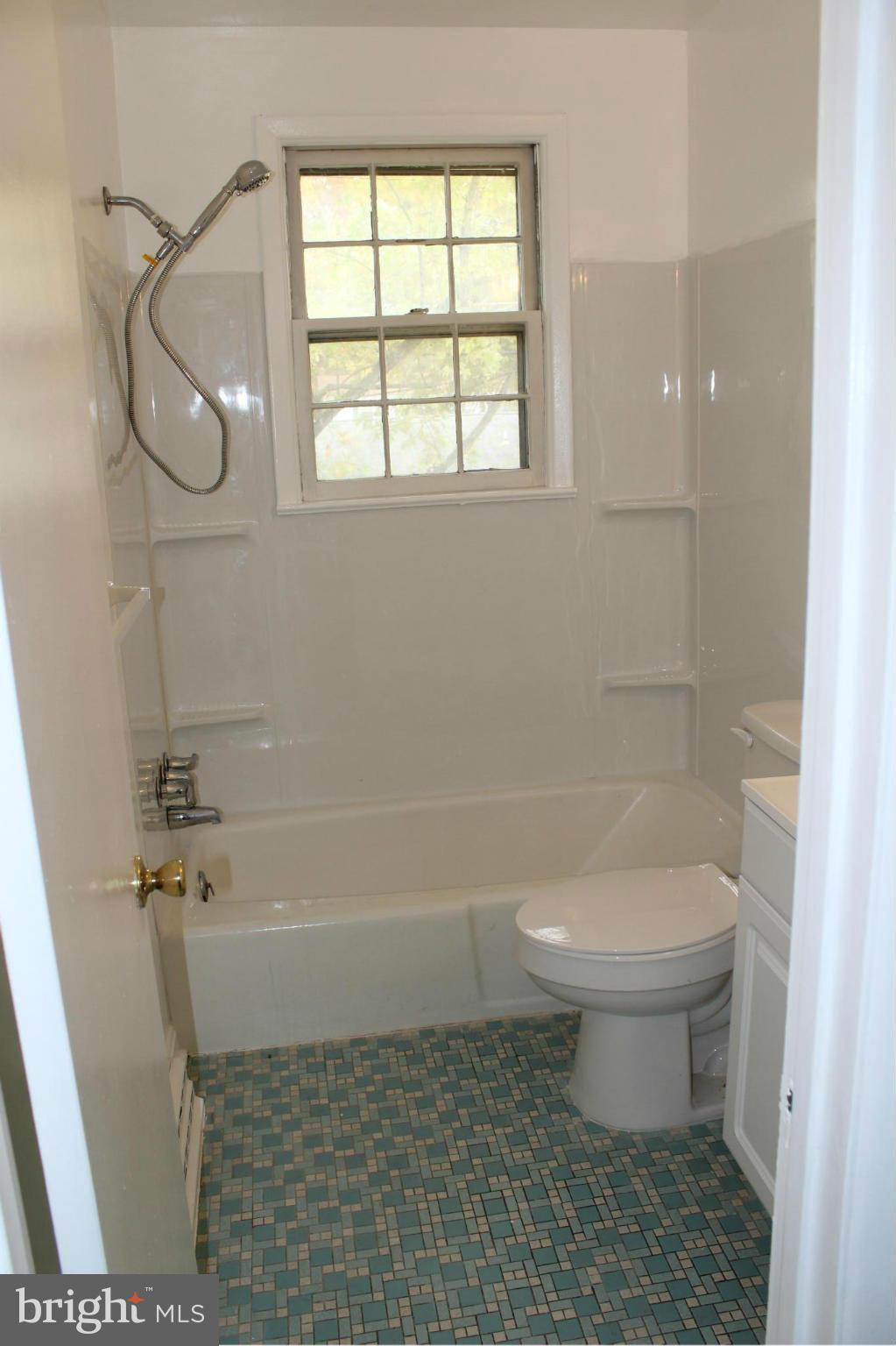 6646 Bucknell Road Bryans Road, MD 20616 - Photo 3 of 28 a bathroom with a toilet and a shower