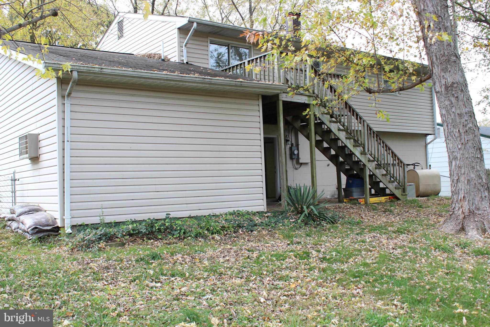 6646 Bucknell Road Bryans Road, MD 20616 - Photo 4 of 28 a view of a house with a yard