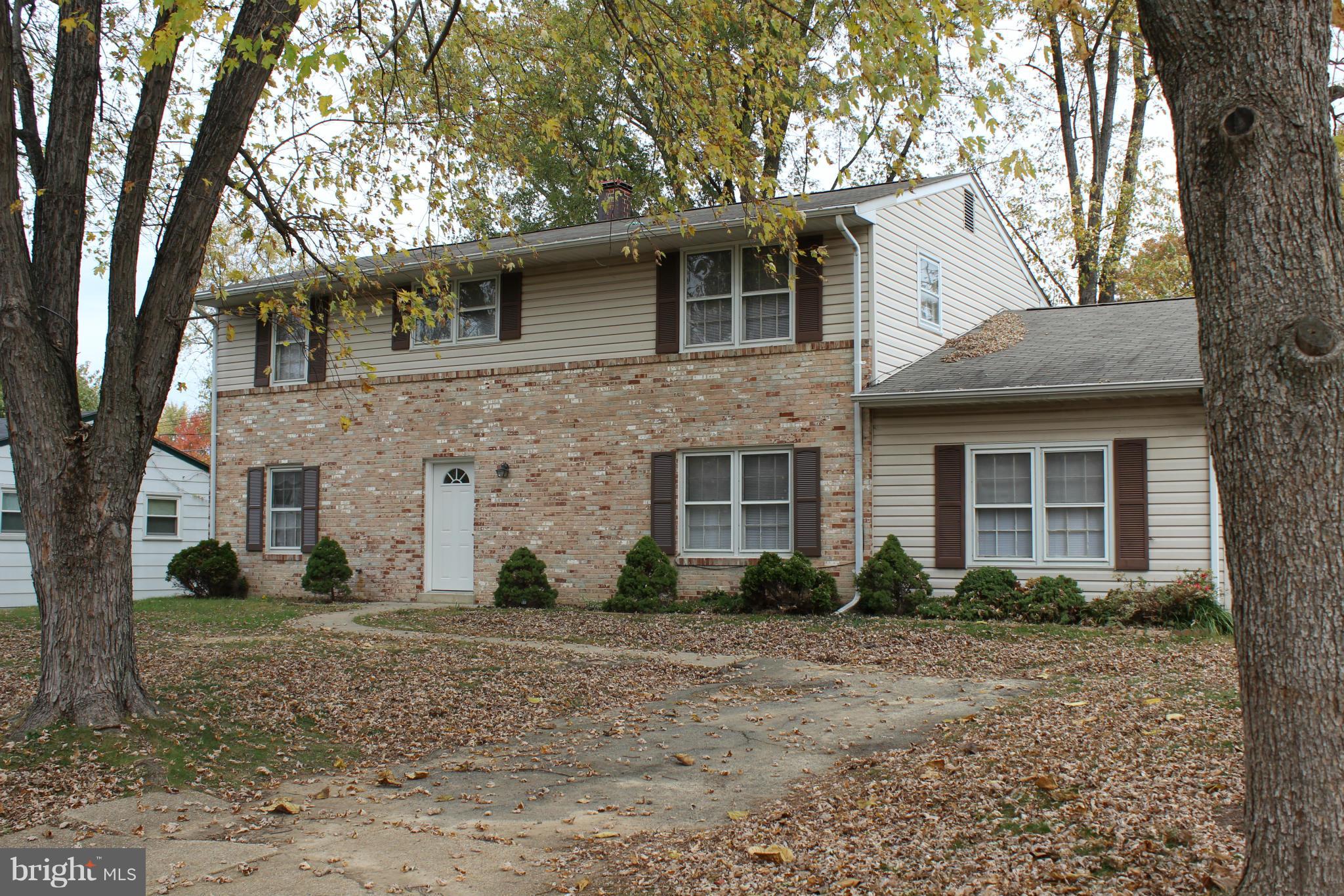 6646 Bucknell Road Bryans Road, MD 20616 - Photo 8 of 28 a front view of a house with garden