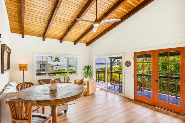 a living room with furniture and a rug