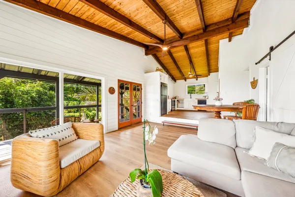 a kitchen with stainless steel appliances a stove a sink and a refrigerator