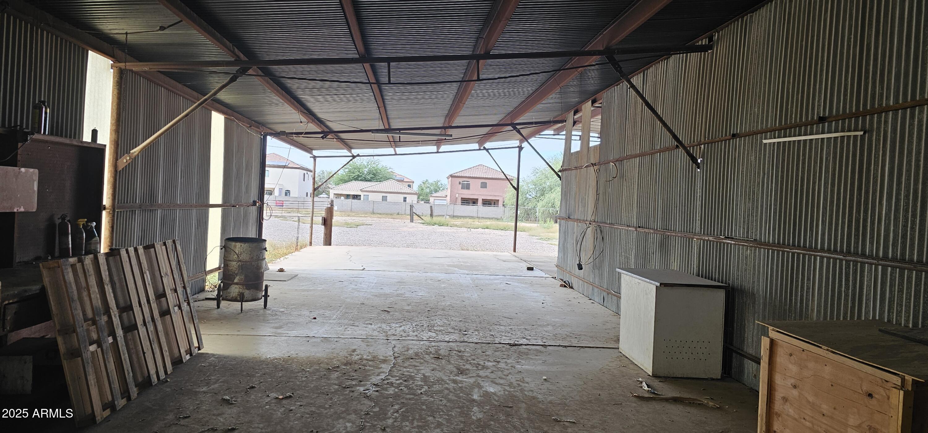 129 South 1st Street Buckeye, AZ 85326 - Photo 13 of 16 a view of a garage