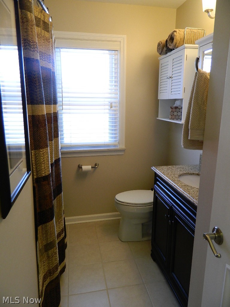 1604 Lyndhurst Road Lyndhurst, OH 44124 - Photo 12 of 35 One of Two Beautifully Updated Full Baths. Newer Wall Mounted Cabinets/Mirror Added for Additional Storage!