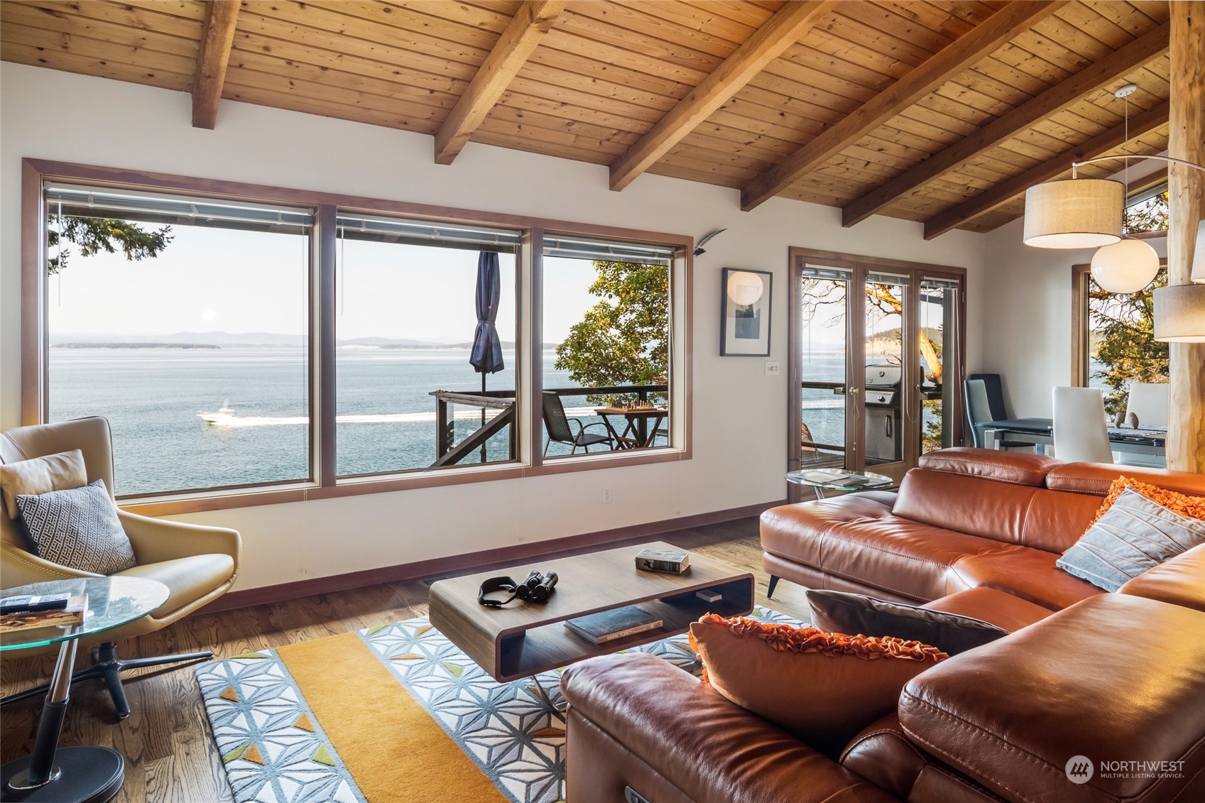 449 Madrona Drive San Juan Island, WA 98250 - Photo 6 of 27 a living room with furniture a large window with outer view