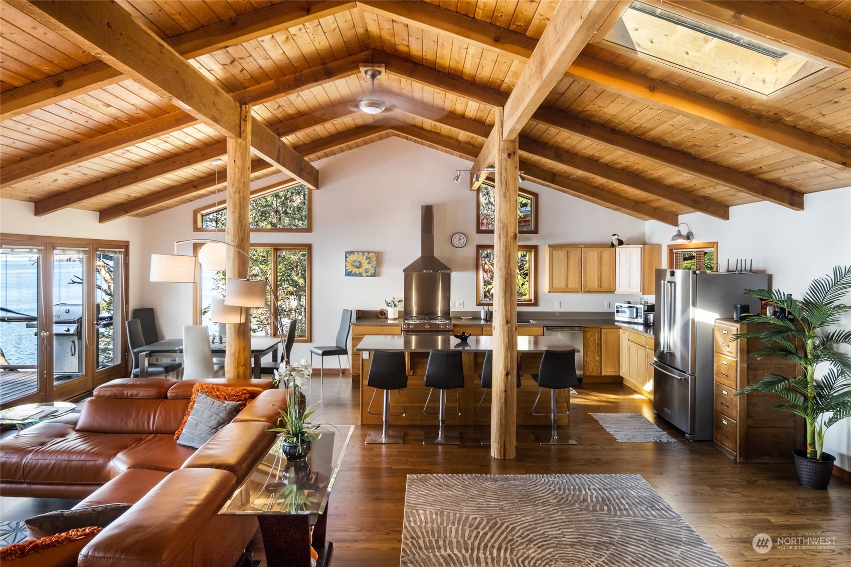 449 Madrona Drive San Juan Island, WA 98250 - Photo 8 of 27 a living room with lots of furniture and a rug