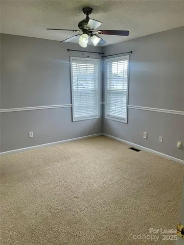 a bathroom with a shower and a bath tub