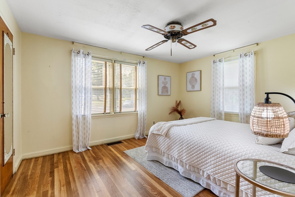 5 Gerry Road Lynnfield, MA 01940 - Photo 12 of 22 a bedroom with a large bed and a window