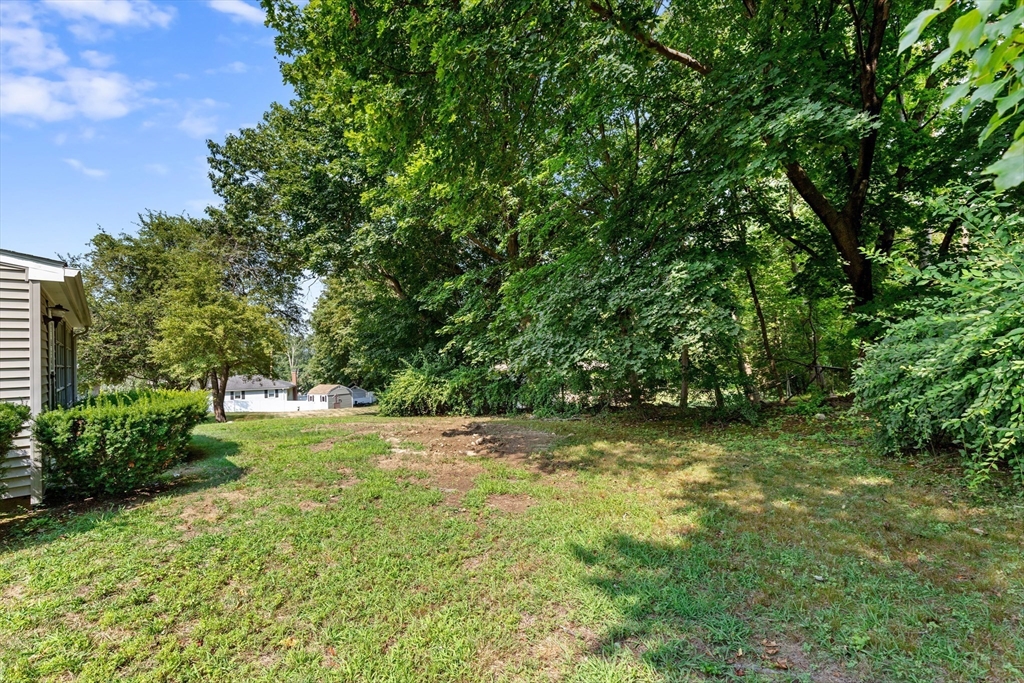 5 Gerry Road Lynnfield, MA 01940 - Photo 20 of 22 a view of a yard with a tree