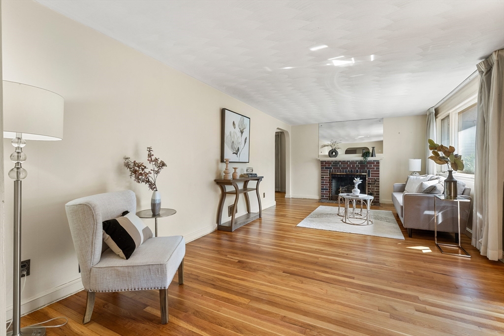 5 Gerry Road Lynnfield, MA 01940 - Photo 3 of 22 a living room with furniture and a table