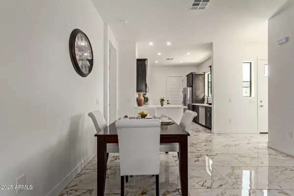 a view of a dining room with furniture