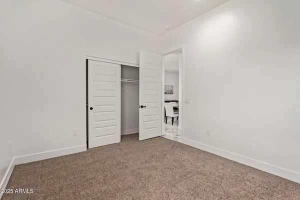an empty room with closet