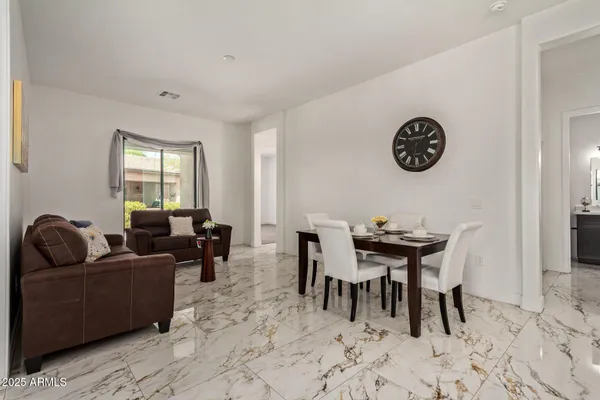 a view of a dining room with furniture