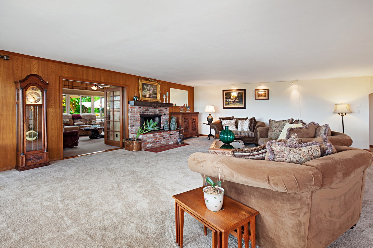 3442 Bumann Road Encinitas, CA 92024 - Photo 6 of 25 EXPANSIVE LIVING ROOM WITH FIREPLACE. FAMILY ROOM ACCESS FROM LIVING ROOM