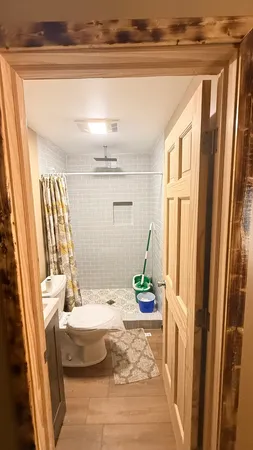 a bathroom with a tub and sink
