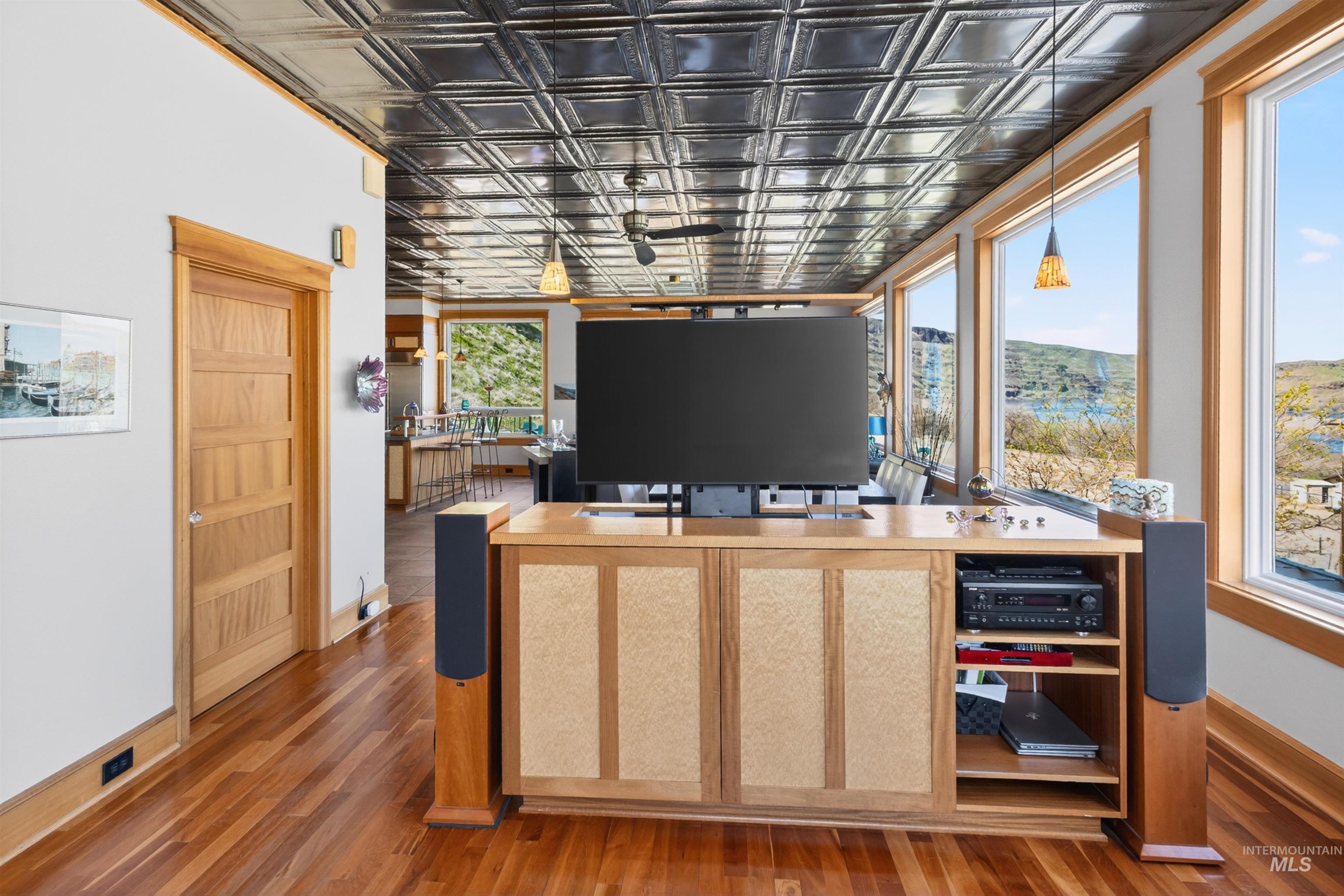 6382 Snake River Road Asotin, WA 99402 - Photo 26 of 34 Home office with an ornate ceiling and dark wood-type flooring