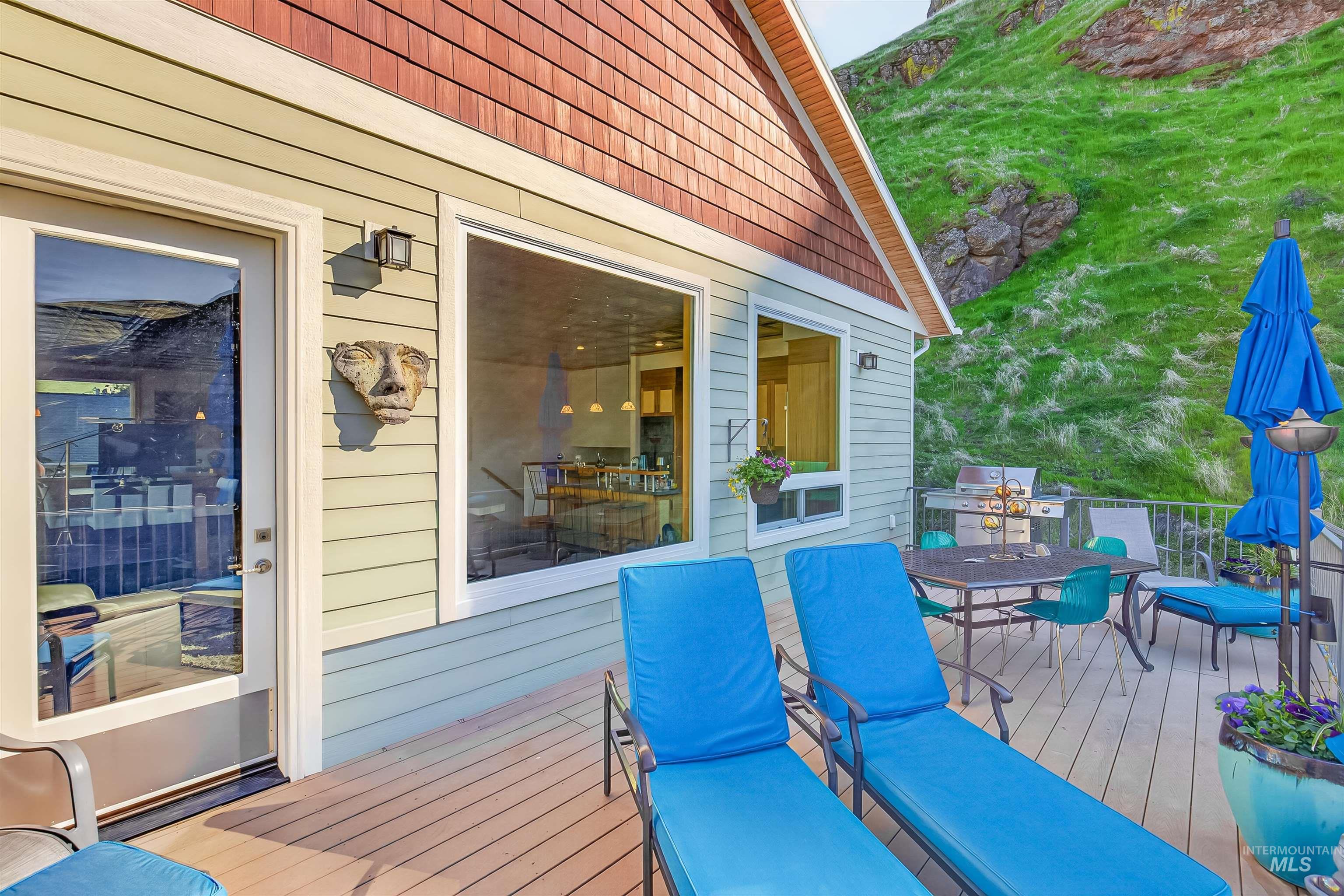 6382 Snake River Road Asotin, WA 99402 - Photo 29 of 34 Wooden terrace featuring outdoor dining area and a grill