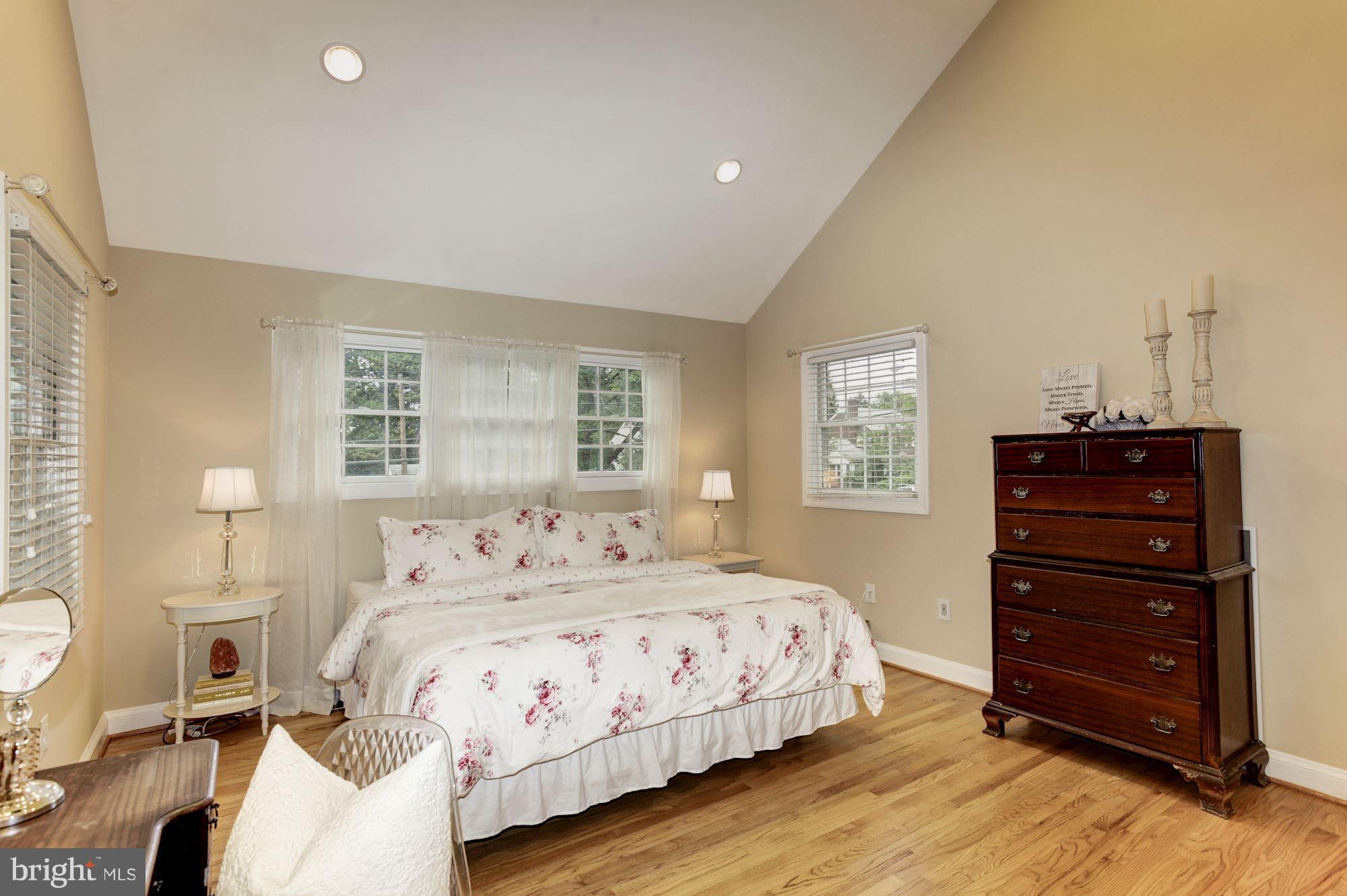 2819 South Arlington Ridge Road Arlington, VA 22202 - Photo 16 of 30 a bedroom with a bed and a window
