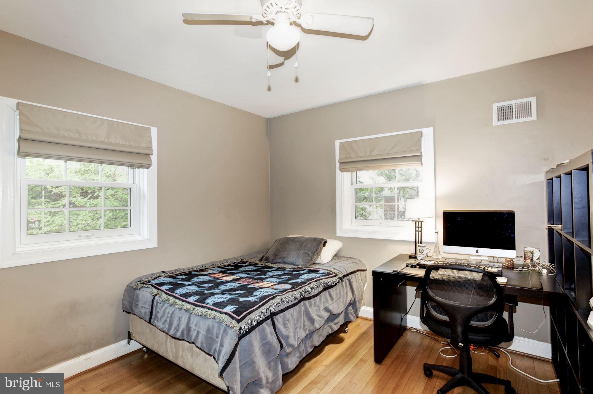 2819 South Arlington Ridge Road Arlington, VA 22202 - Photo 22 of 30 a view of a workspace with furniture and a window