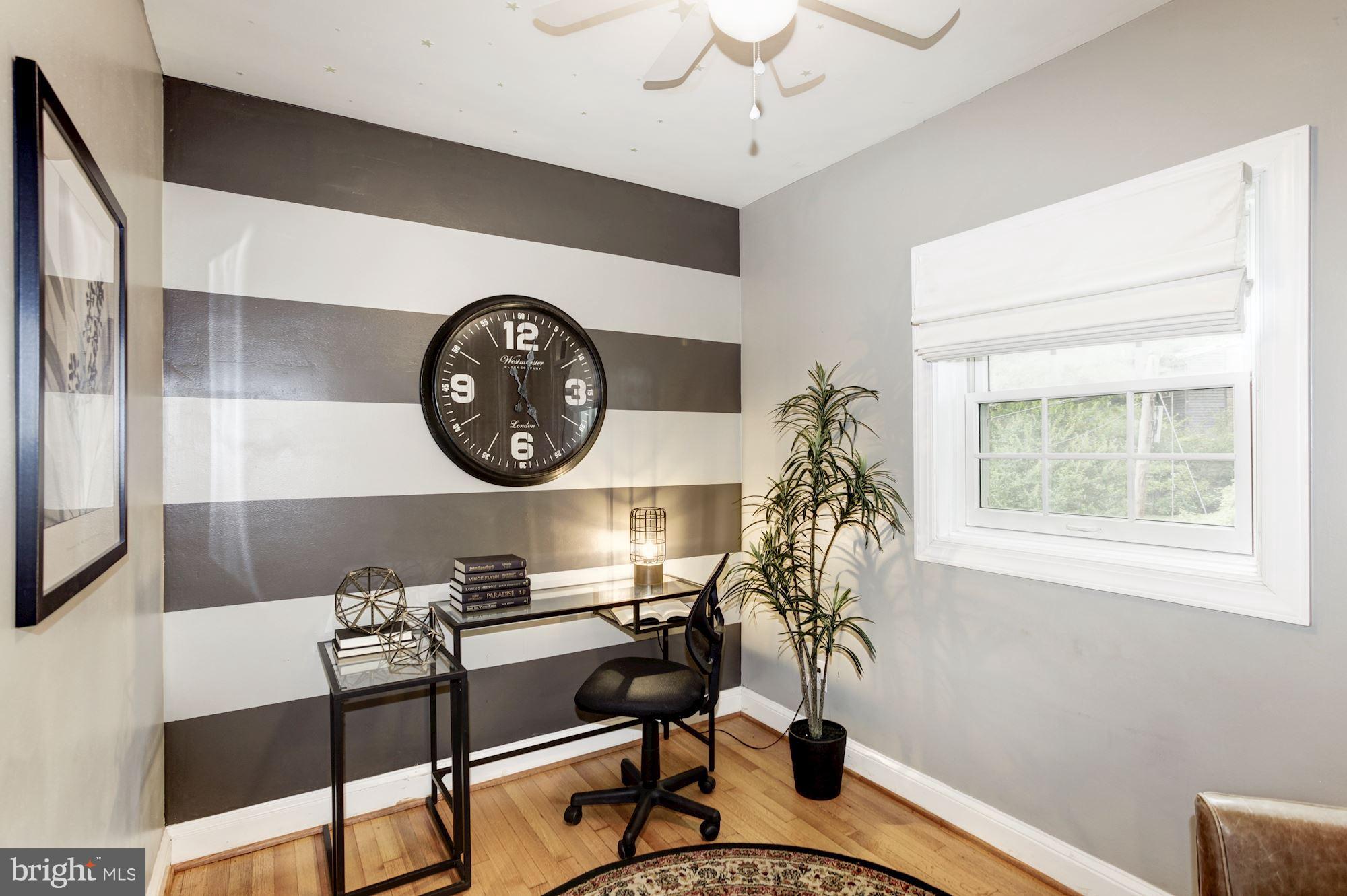 2819 South Arlington Ridge Road Arlington, VA 22202 - Photo 23 of 30 a view of a workspace with furniture and a window