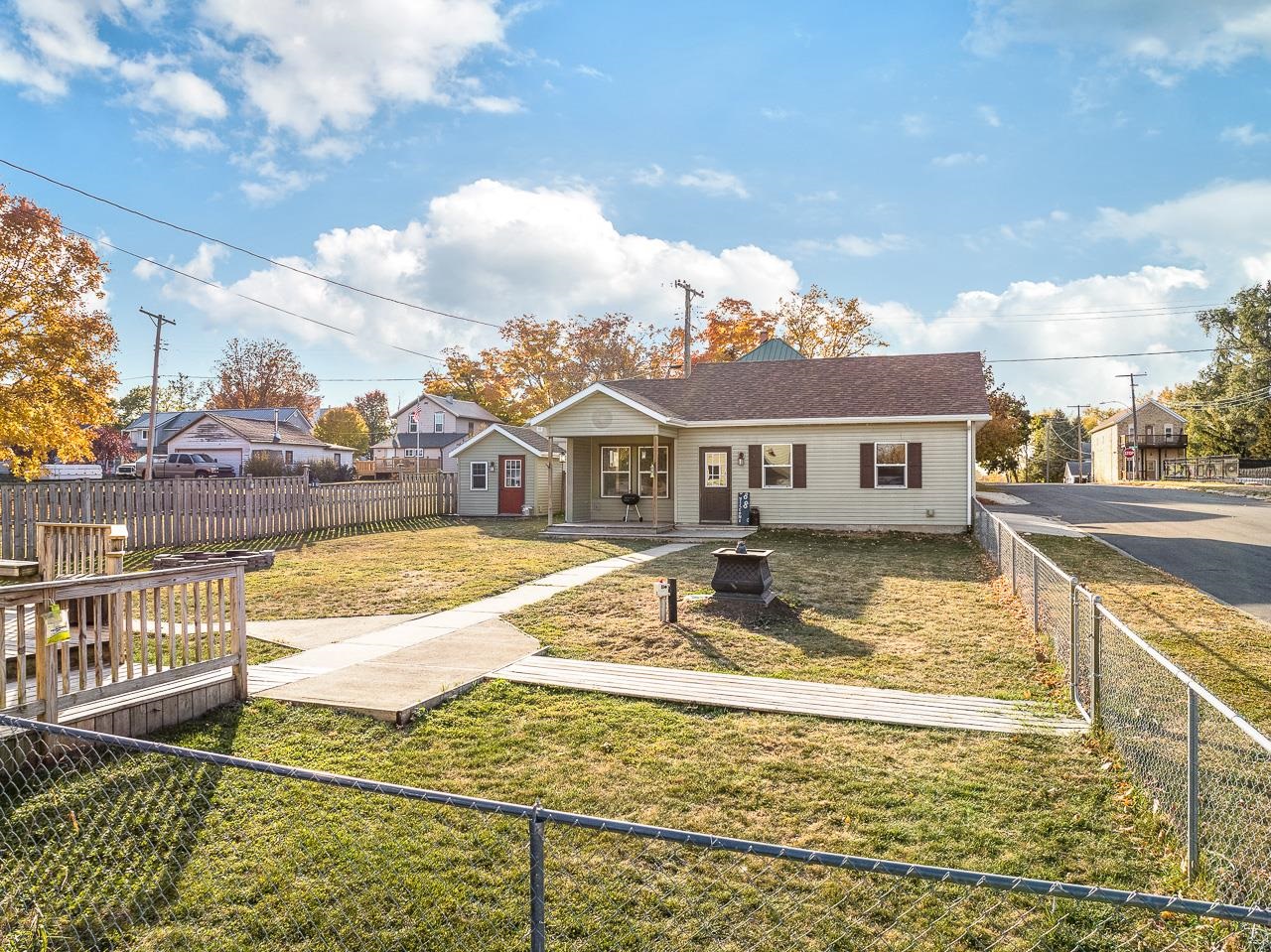 300 Washington Street Ridott, IL 61067 - Photo 6 of 39 a view of a swimming pool with a patio