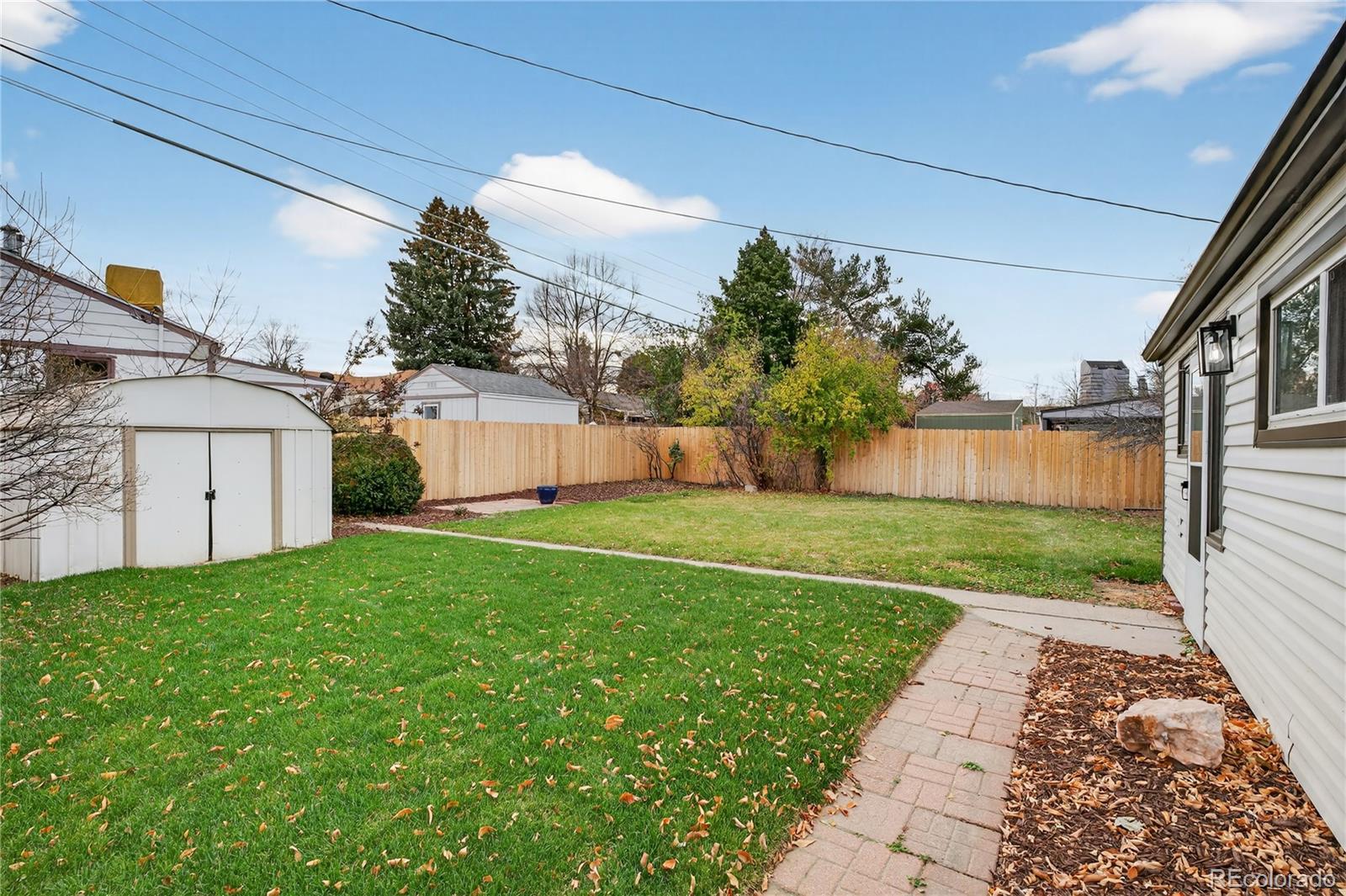 4910 East Missouri Avenue Denver, CO 80246 - Photo 32 of 42 a view of a back yard of the house