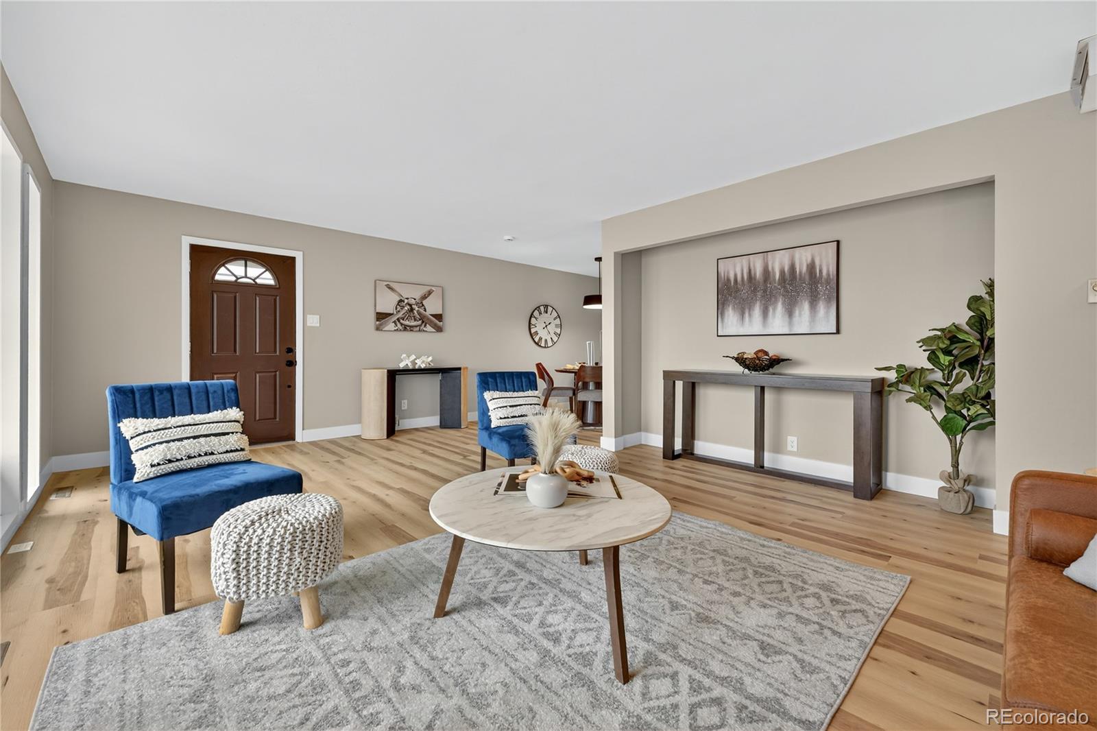 4910 East Missouri Avenue Denver, CO 80246 - Photo 5 of 42 a living room with furniture