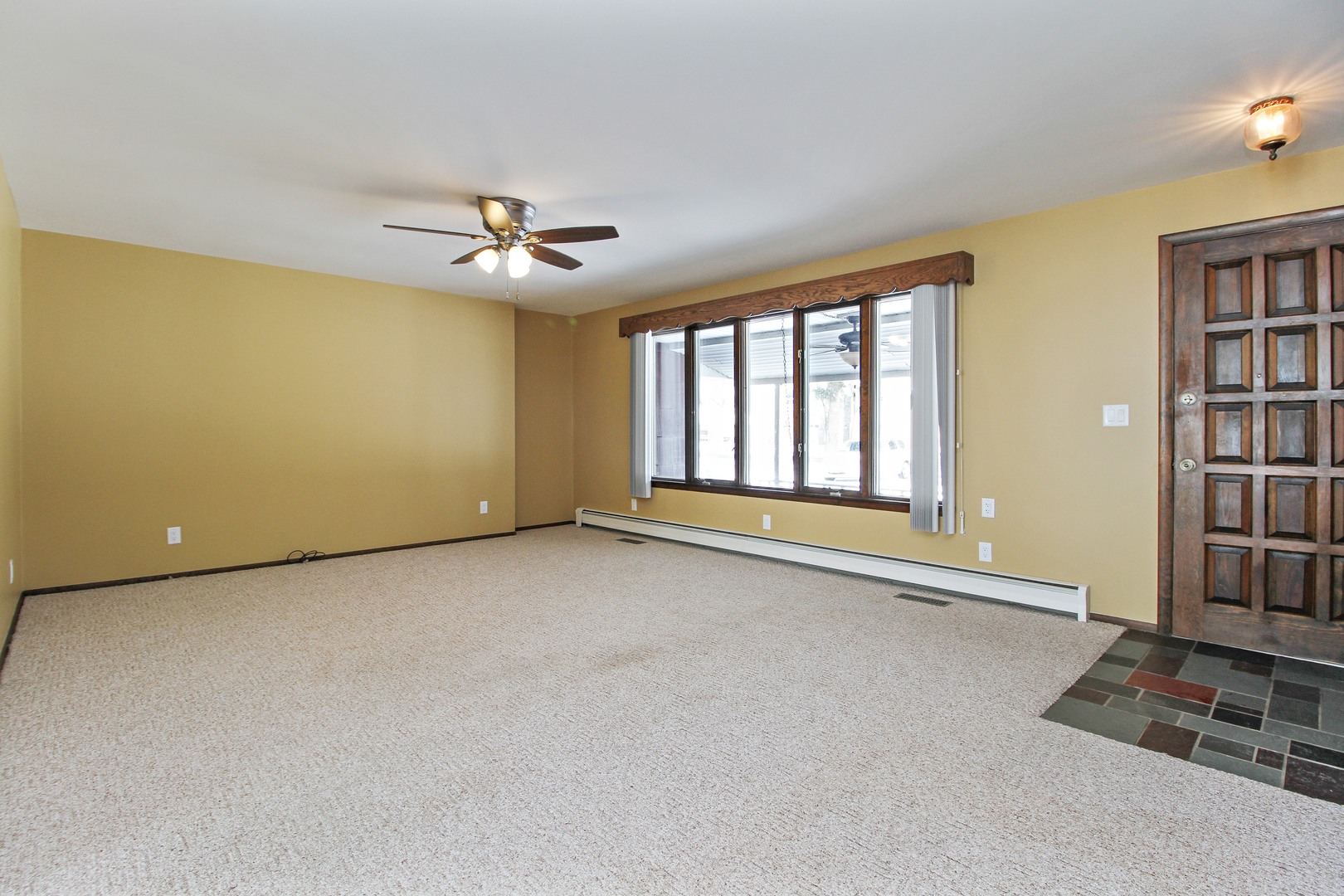 3122 River Road Kankakee, IL 60901 - Photo 2 of 15 a view of an empty room with a window