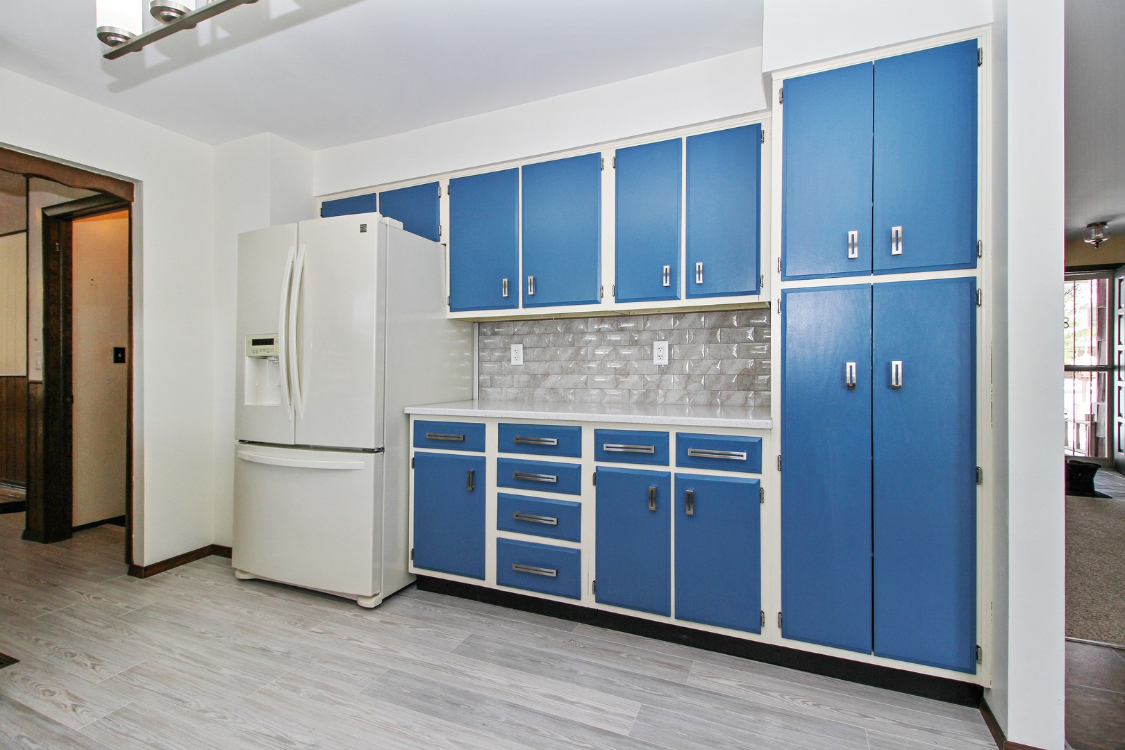 3122 River Road Kankakee, IL 60901 - Photo 7 of 15 a kitchen with a refrigerator and a stove