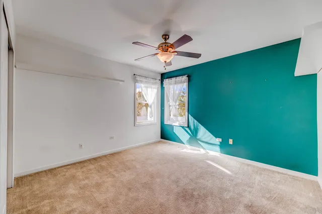 a view of a room with a large window