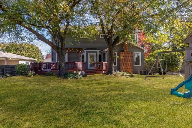 a fire hydrant in the middle of a field