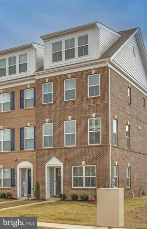 a front view of a building with garden