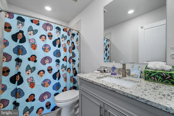 a living room with lots of baby toys