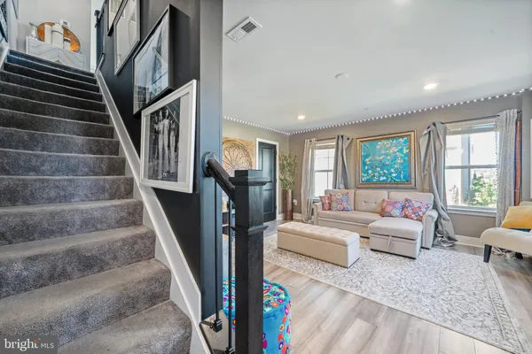 a view of dining table with chairs