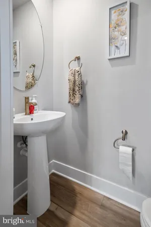 a view of an empty space with backyard and a tree