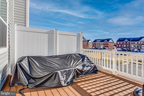 a view of a balcony with couch