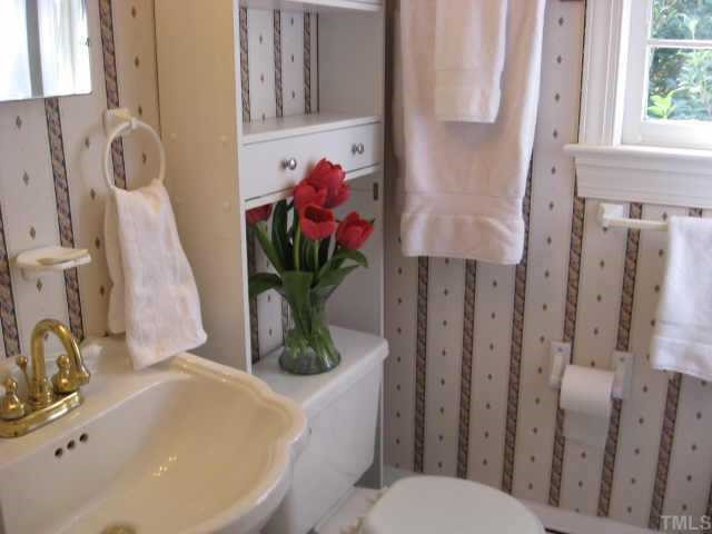837 Bryan Street Raleigh, NC 27605 - Photo 9 of 11 Full bath with pedestal sink, cabinet & shelves.. Other