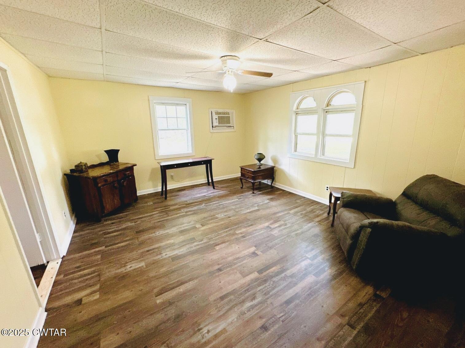 135 River Bend Road Brownsville, TN 38012 - Photo 8 of 14 a living room with furniture and a wooden floor