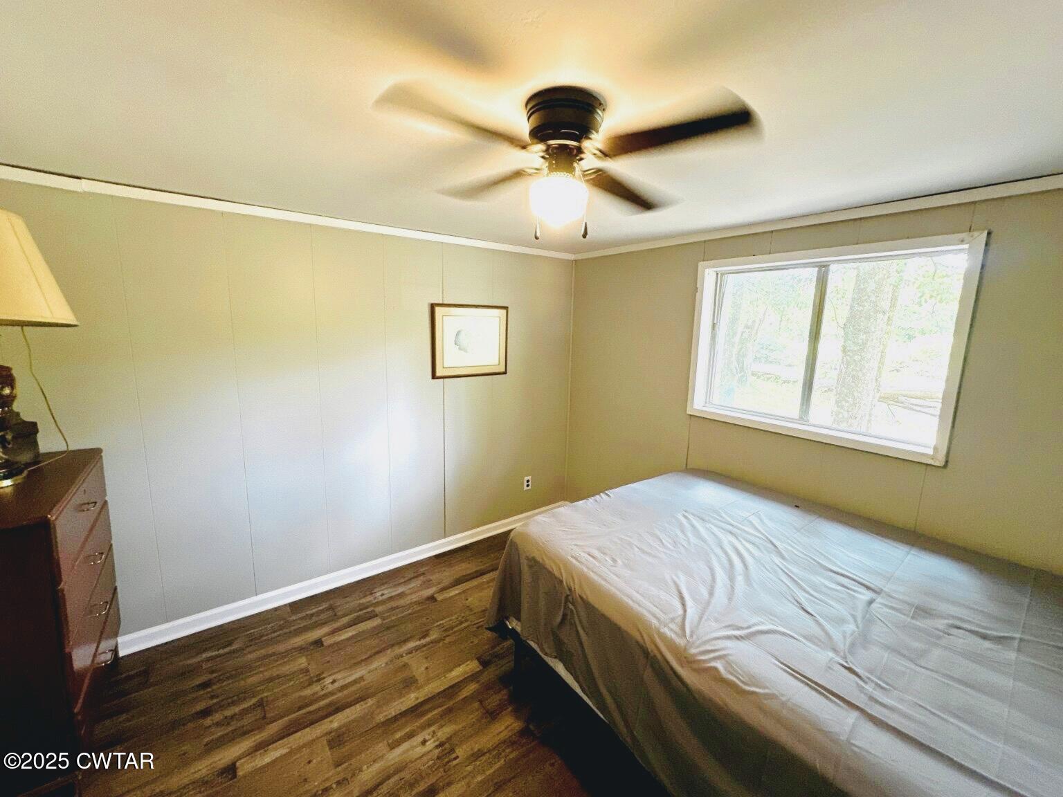 135 River Bend Road Brownsville, TN 38012 - Photo 10 of 14 a bedroom with a bed and a window