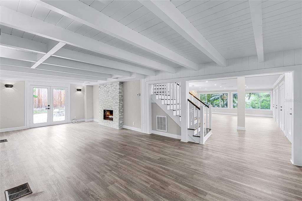 311 East 8th Avenue Windermere, FL 34786 - Photo 12 of 59 a view of empty room with wooden floor