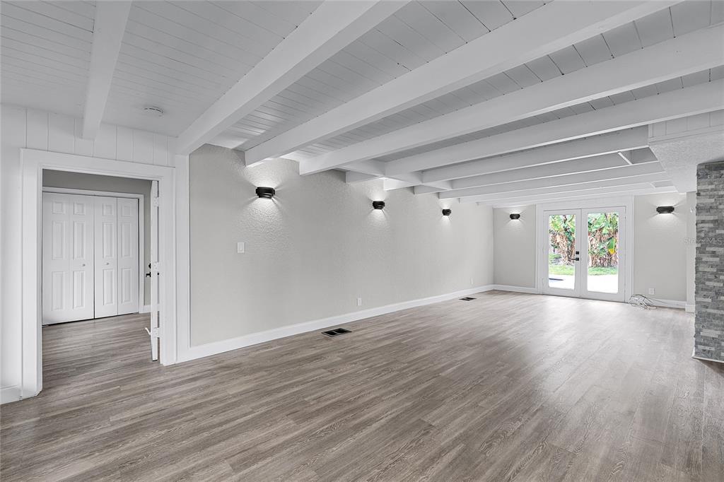 311 East 8th Avenue Windermere, FL 34786 - Photo 13 of 59 a view of an empty room and window