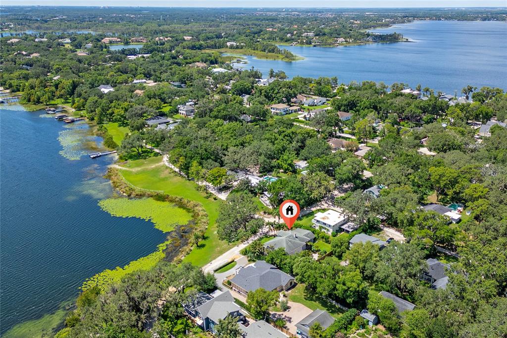 311 East 8th Avenue Windermere, FL 34786 - Photo 55 of 59 an aerial view of a house with a yard