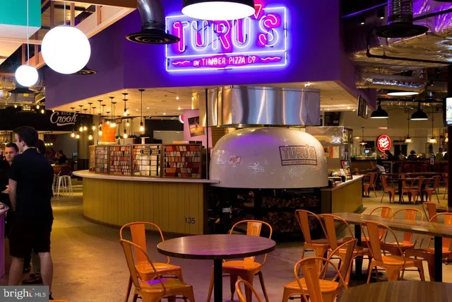 a view of a building with sitting area