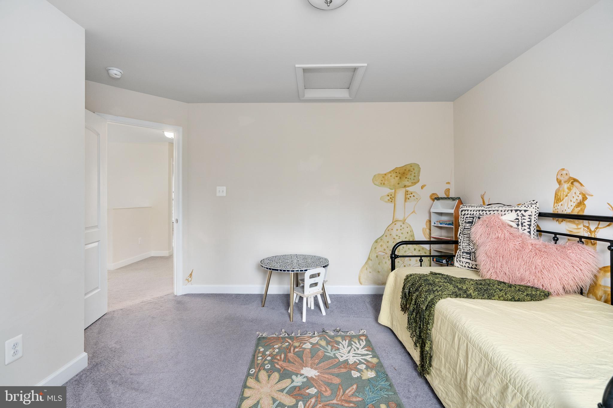 109 12th Street Colonial Beach, VA 22443 - Photo 24 of 33 a bedroom with bed and chair