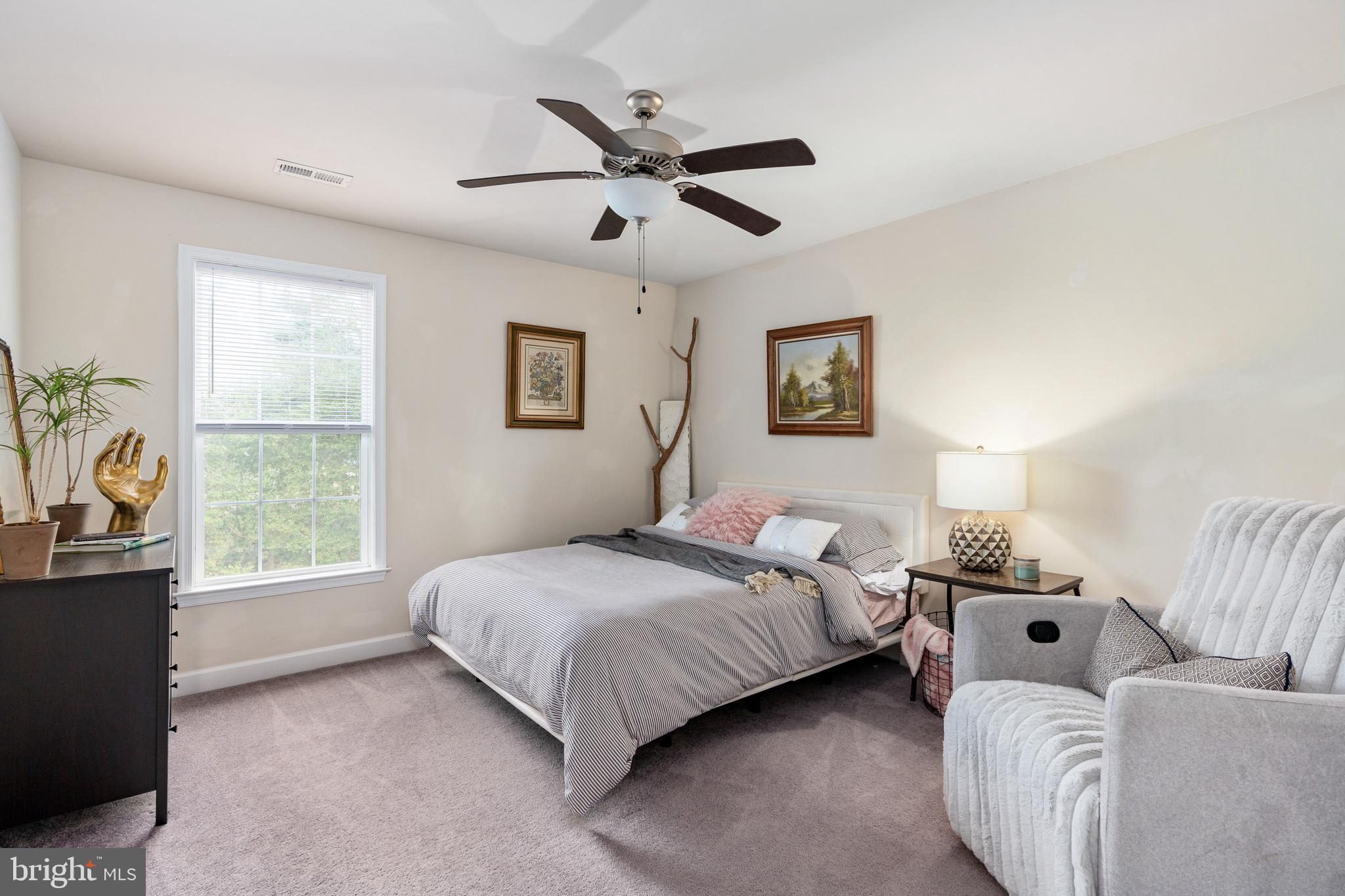 109 12th Street Colonial Beach, VA 22443 - Photo 25 of 33 a bedroom with a bed and a window