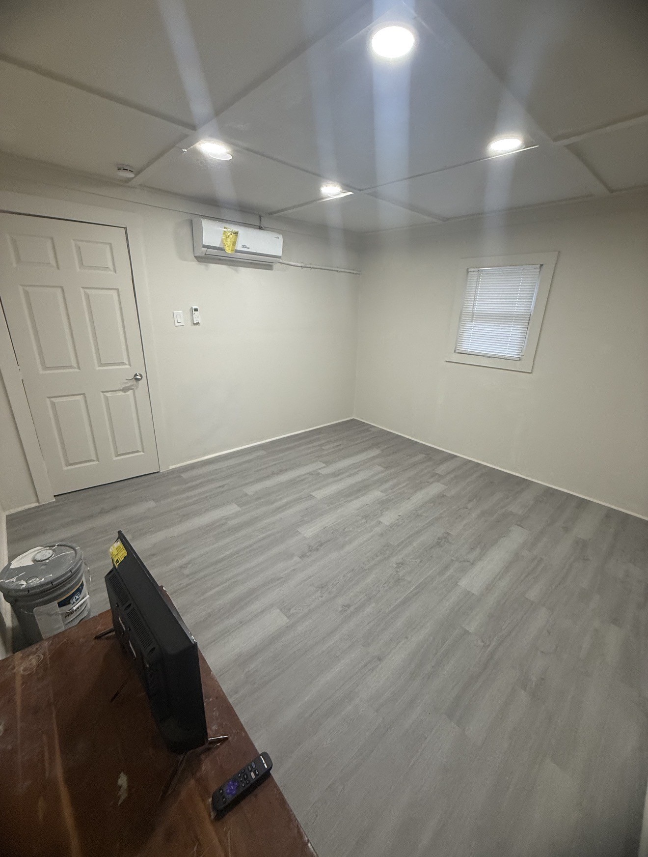 1009 Thomas Boulevard Port Arthur, TX 77640 - Photo 7 of 14 an empty room with wooden floor