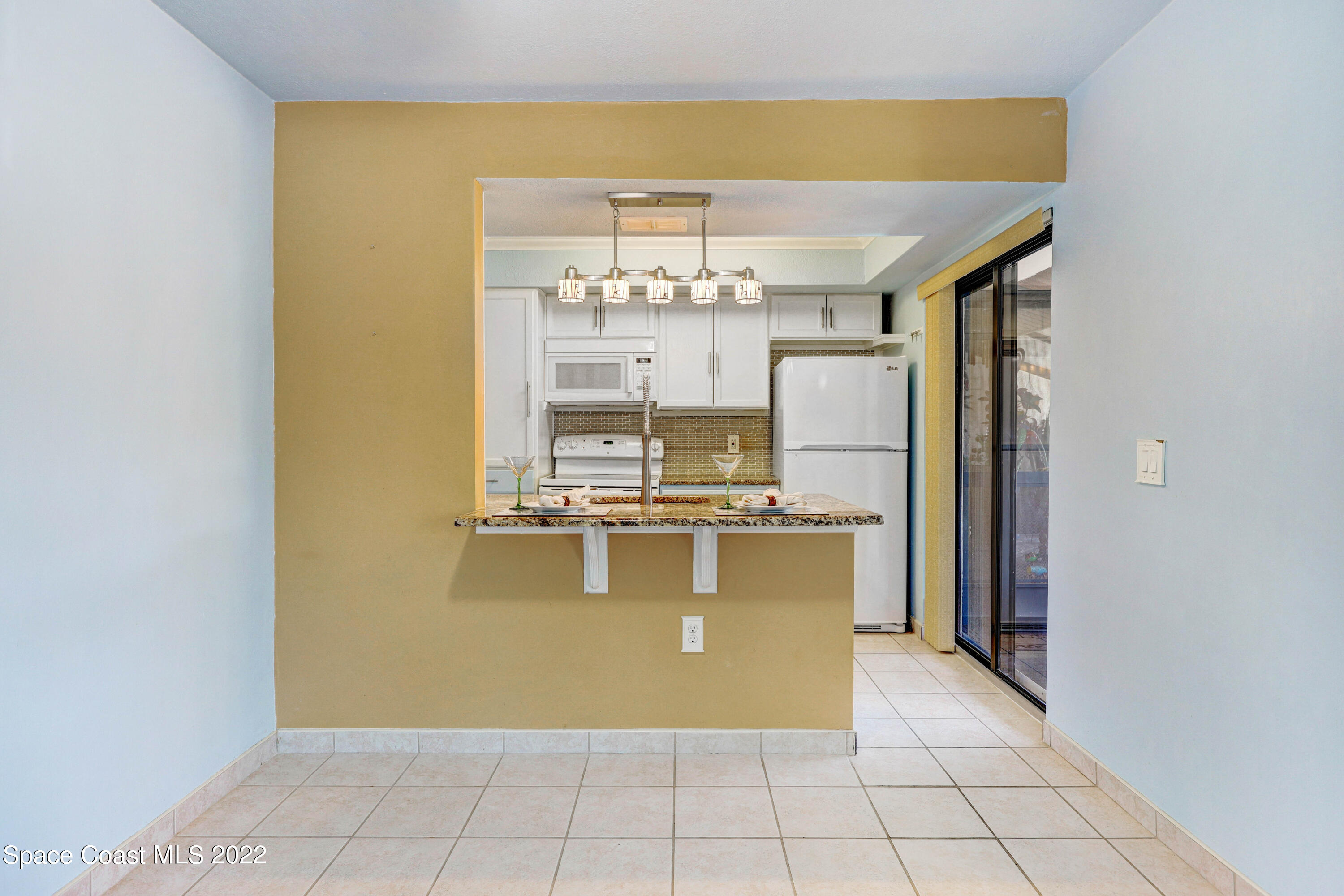 624 Ridge Club Drive, Unit 86 Melbourne, FL 32934 - Photo 5 of 19 Kitchen & Dining Room