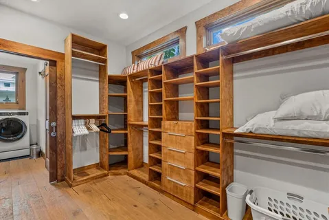 a view of a patio with table and chairs and potted plants