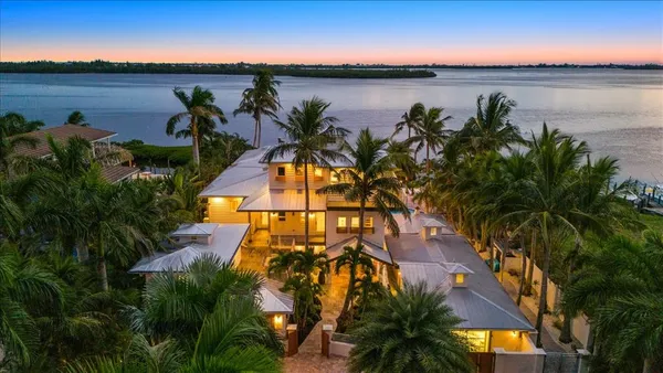 a table with chairs a washer and dryer