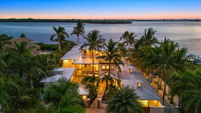 a table with chairs a washer and dryer