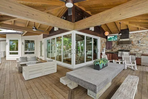 a view of an empty room with wooden walls